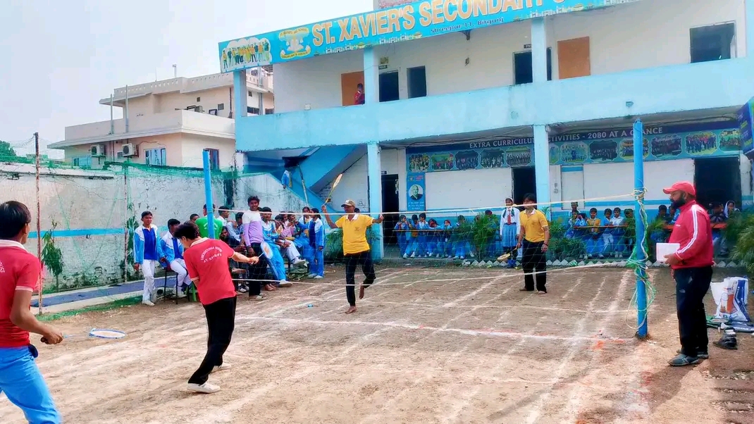 Badminton Match In Courtyard